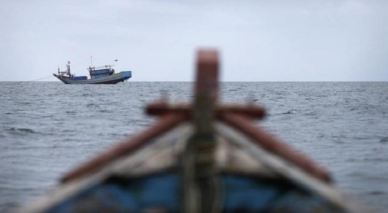 Traditional fishing boats work off the east coast of Natuna Besar